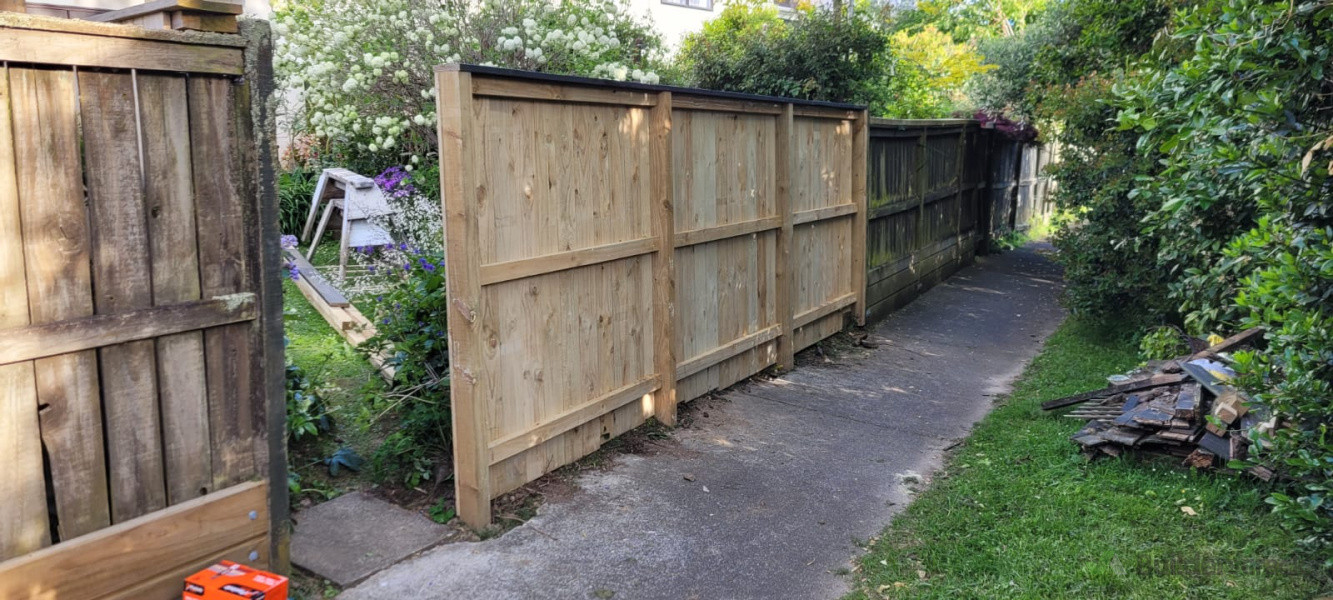 New fence in row of townhouses