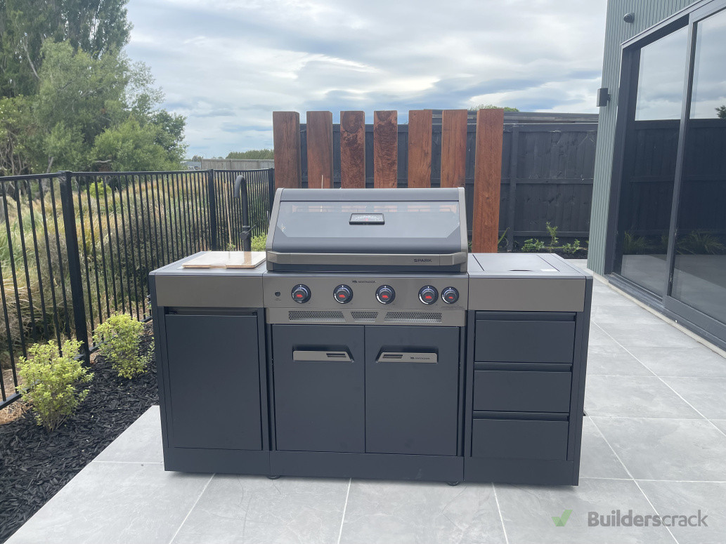 Successfully completed assembling a large BBQ machine.