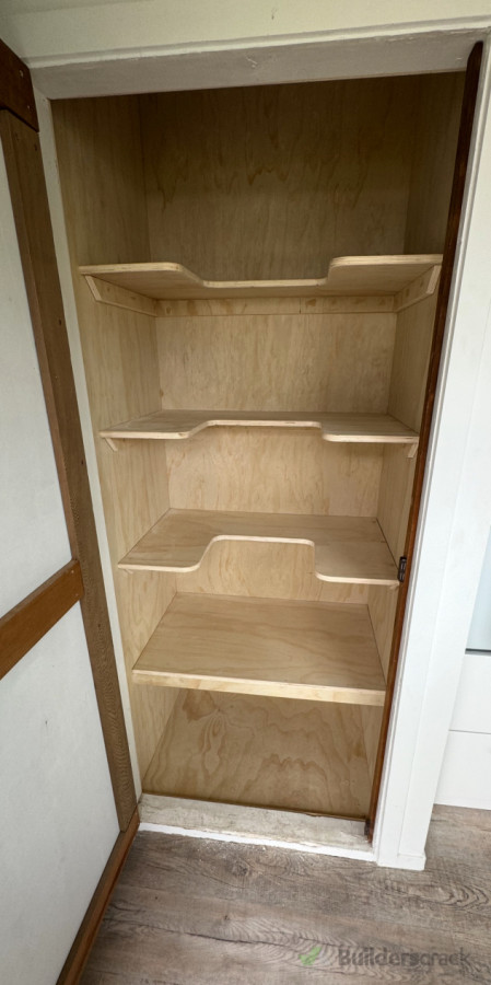 Turned old grubby storage cupboard into shelving for condiments