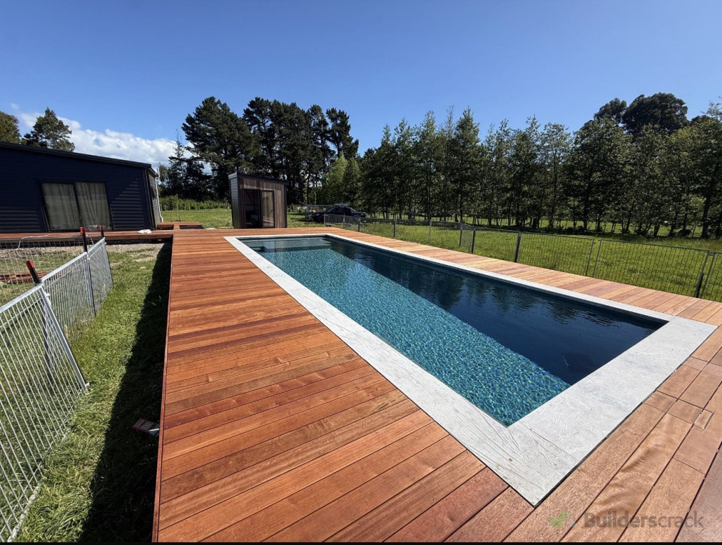 Beautiful kwila deck wrapping around the pool
