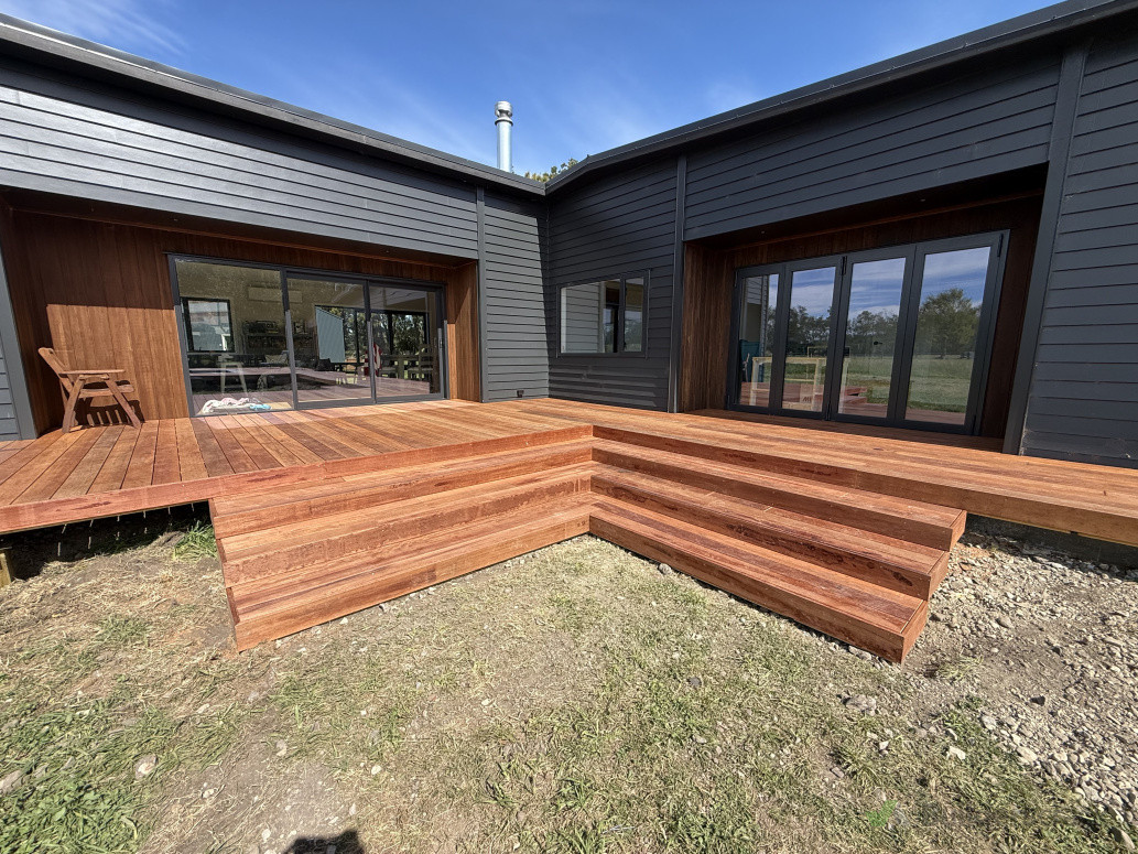 After finishing this build the clients requested a smooth kwila deck and stairs leading around to their new pool to kick off their outdoor area, just in time for the Christmas holidays.