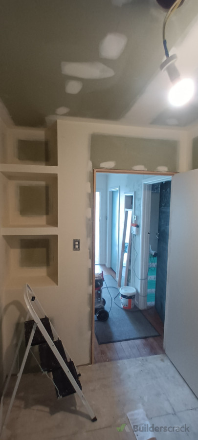 Bathroom renovation with feature shelves