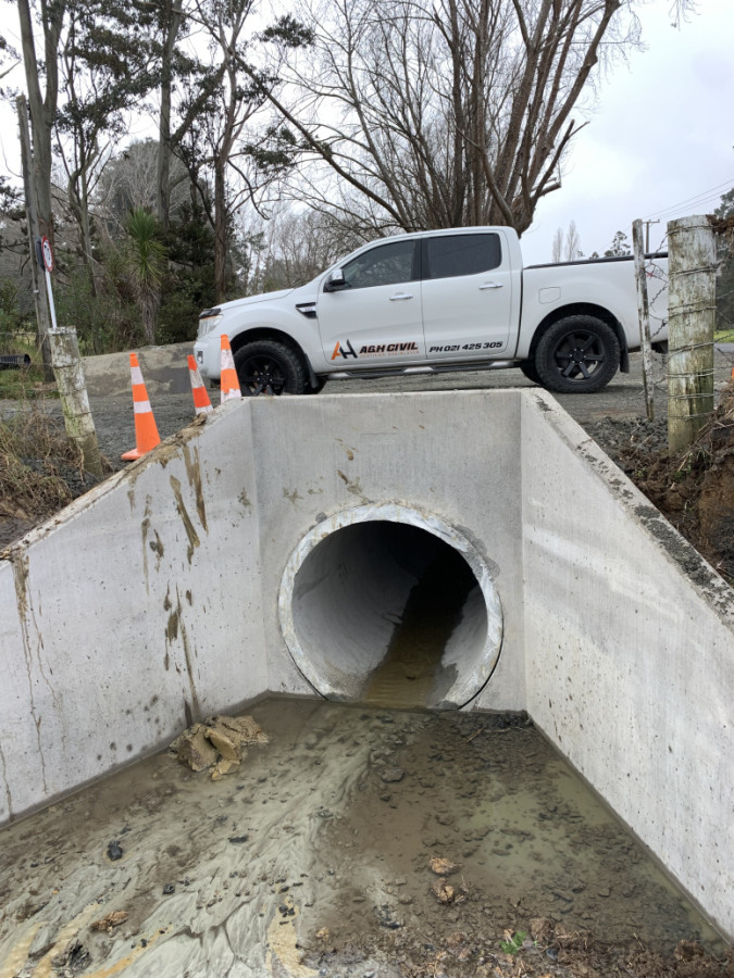 Concrete pipe works include wing walls pipe laying