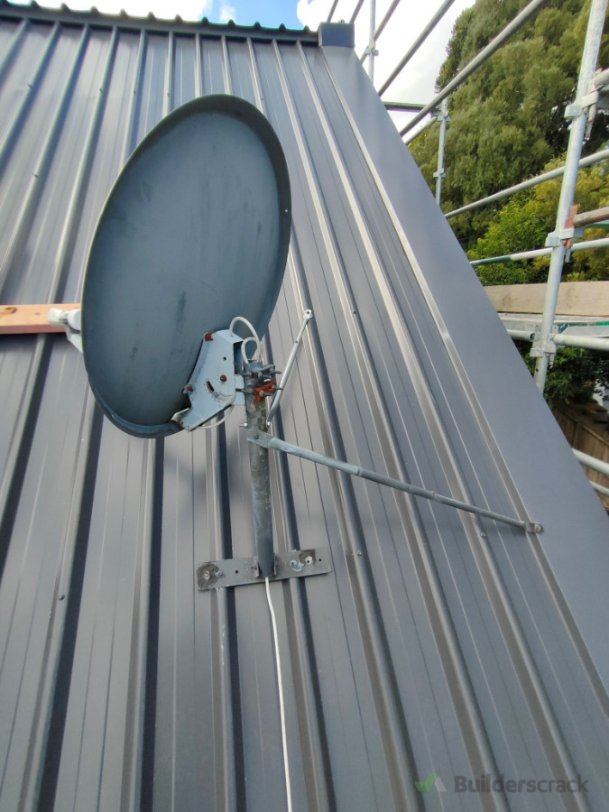 Sky TV dish realigned after roof replaced
