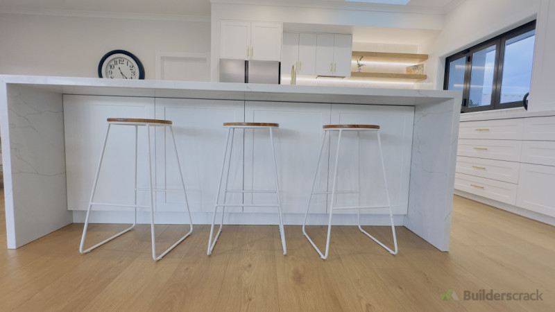 Island back with push to open storage cabinet and sitting for three