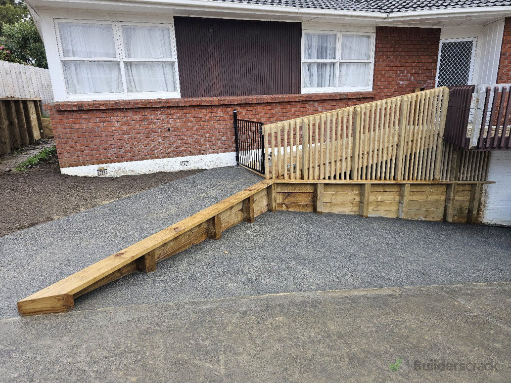 Outdoor retaining walls, ramp for wheelchair access and driveway extended. New drainage done right rough the house