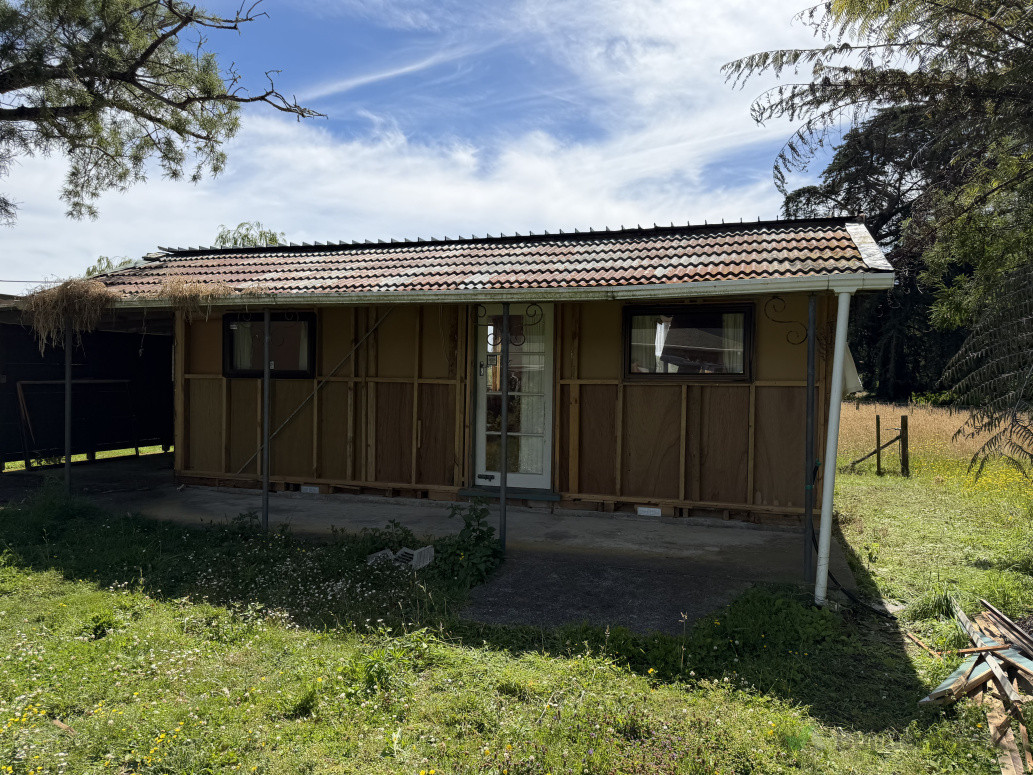 Asbestos cement cladding removal on a sleep out