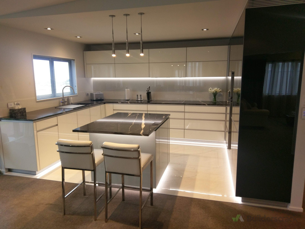 Installation work, glass fronted cabinetry and panels