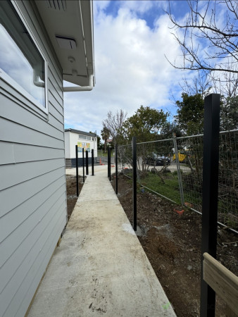 Before: Fence posts set.