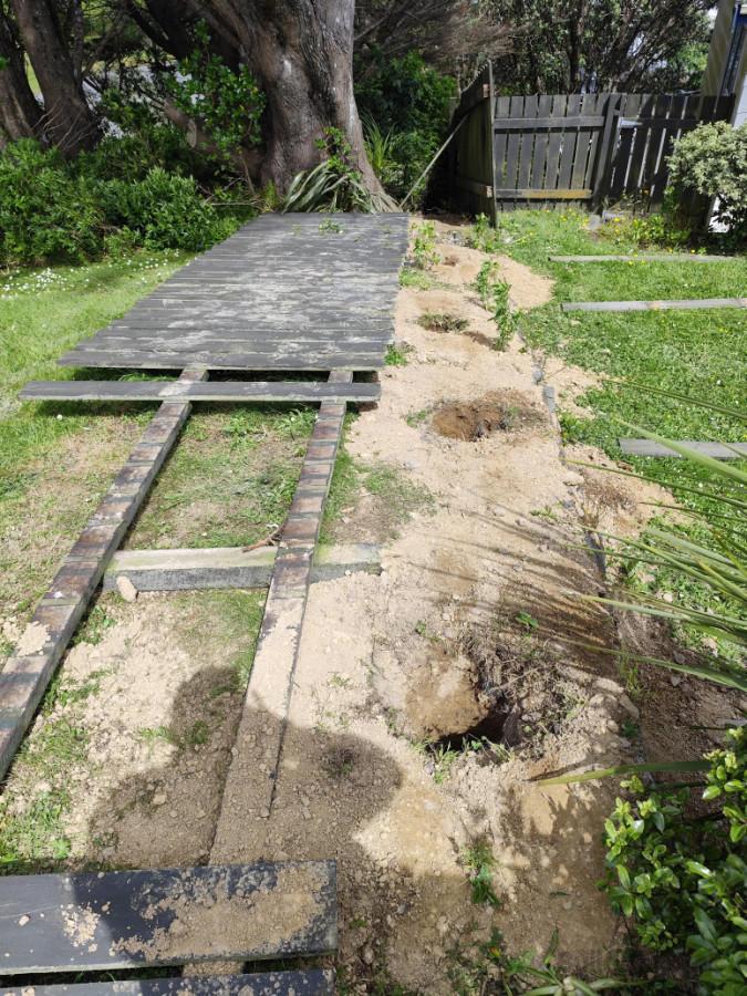 The fence collapsed after storms.