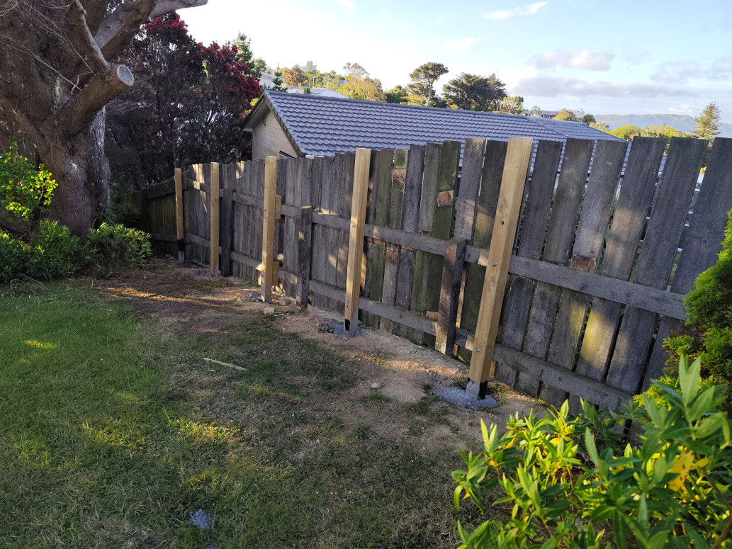 Rebuilding the fence.