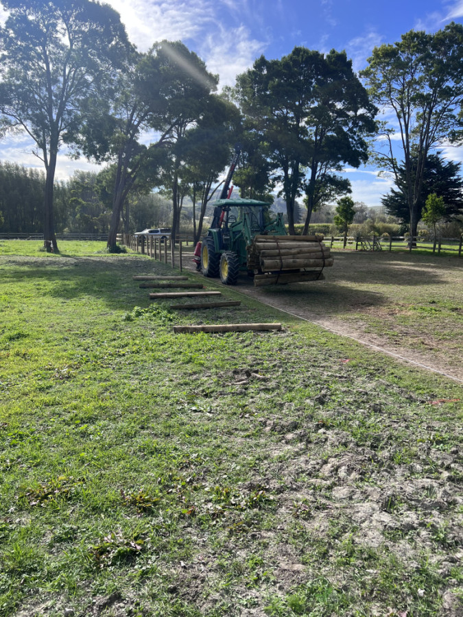 Tractor and rammer at work