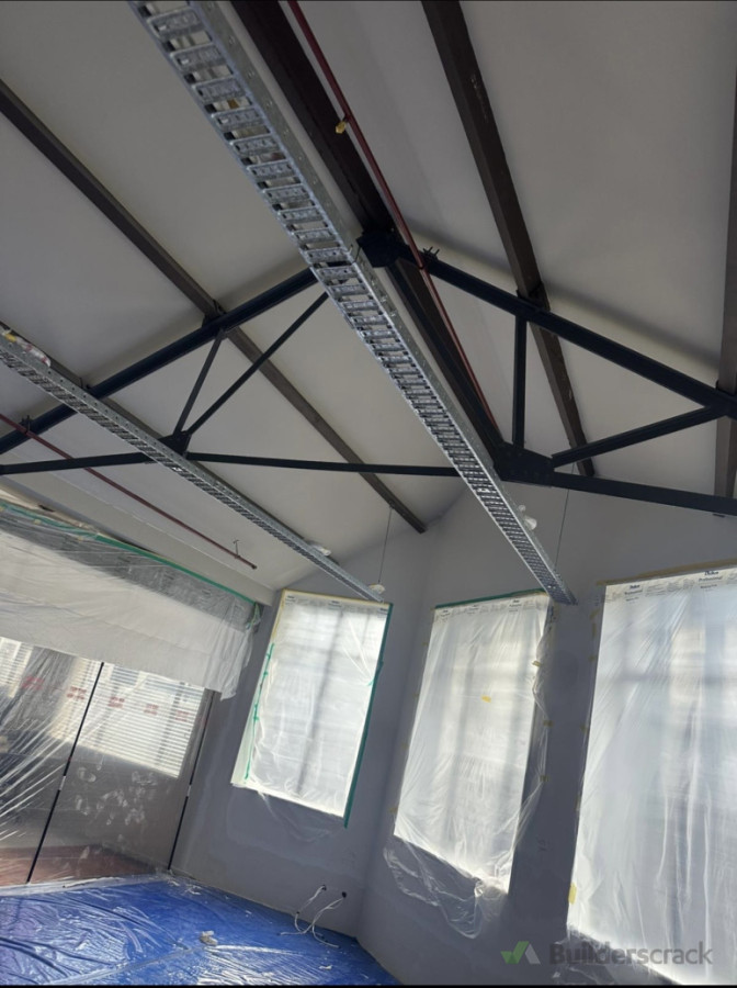 Comprehensive site preparation  for an interior refresh. We take great care to mask all surfaces and protect the workspace before any painting begins.s