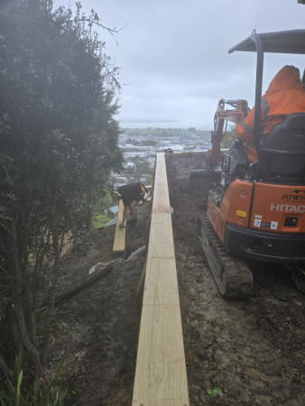 Timber edging & track rolling Retaining back fill