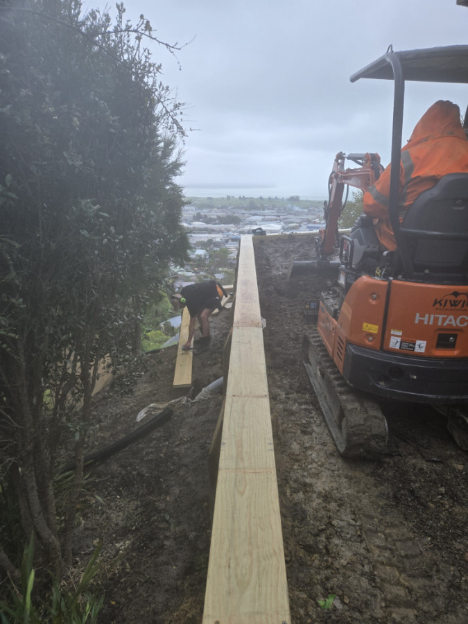 Timber edging & track rolling Retaining back fill