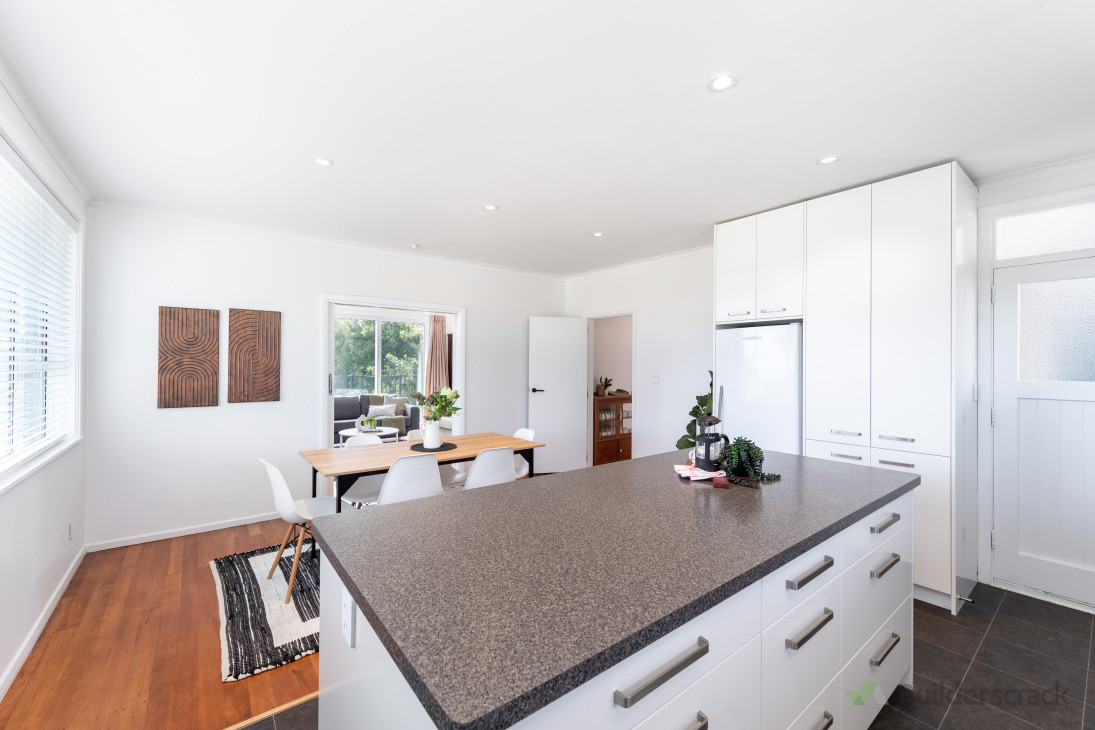 re sanded and finished the beautiful  Matai floors and fully repainted the whole interior