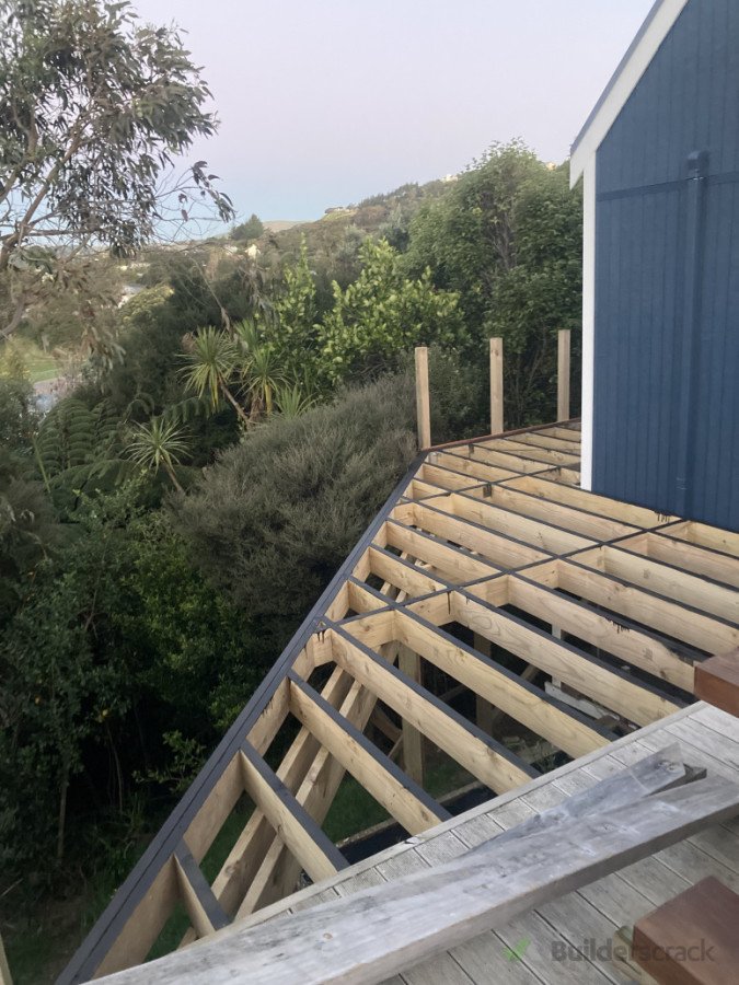 We recommend painting or staining the tops of the joist black to protect them and give the decking a floating effect visually.
