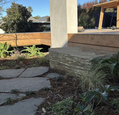 Paradise paving, mulch, plants and stepping stone