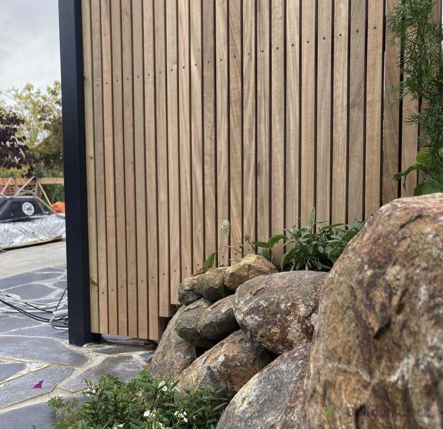 Sefton ave, Grey Lynn project. Vitex fence, bluestone crazy paving, boulders and garden installation