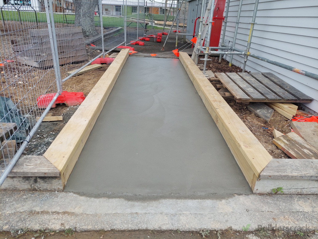 New concrete footpath with surround