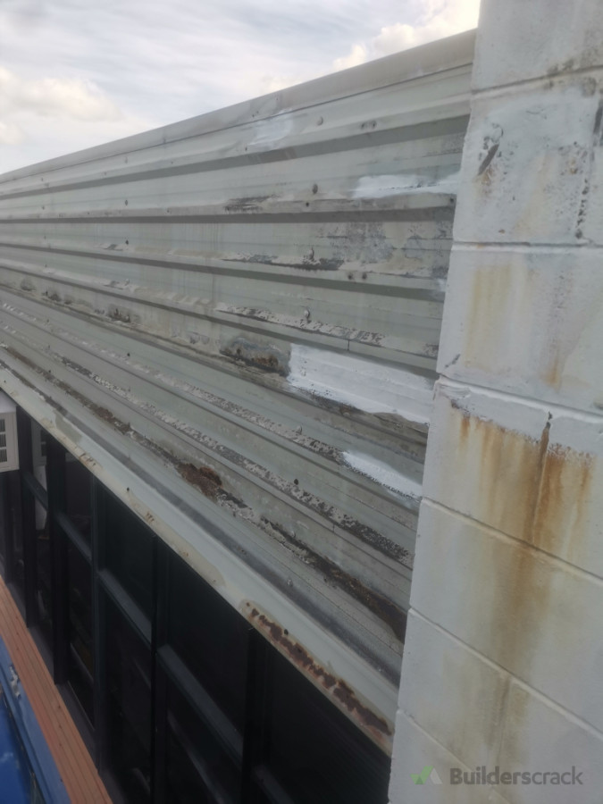 Rust repairs first sanded then apply with rust converter then and oil based primer before top coating