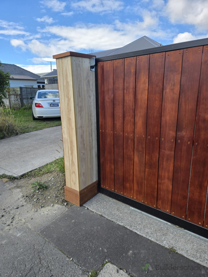 Full front fence and double slider install customer just has to stain the pillar