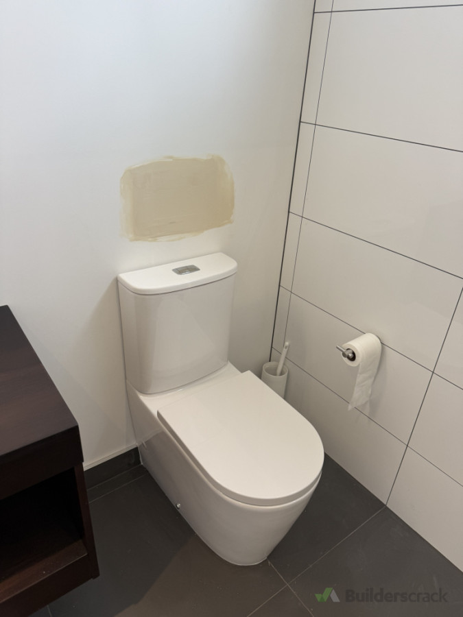 In wall wc to front of wall wc