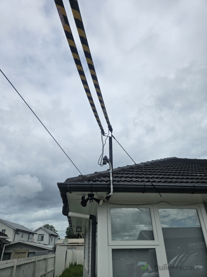 Main Power line to house strengthen brace brackets.