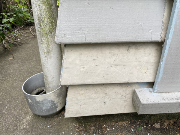 A couple of weatherboards in behind a door jamb, before the scriber was reinstated.