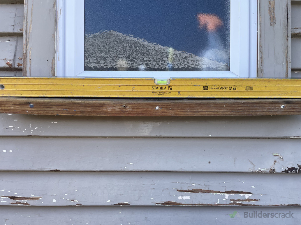 A windowsill with a massive sag.