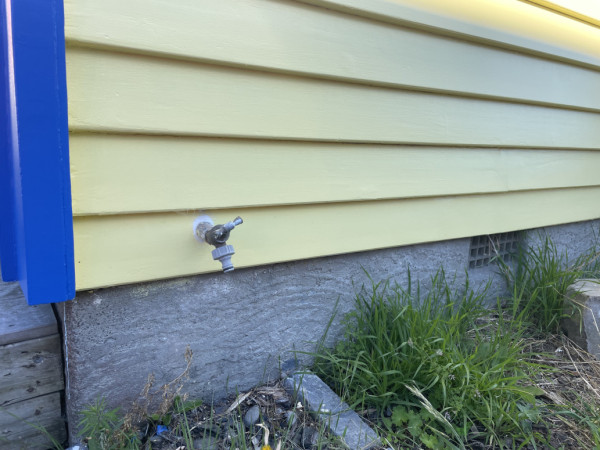 The replaced weatherboards, all painted.