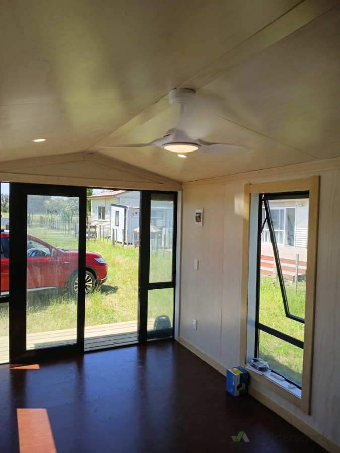 Spare room for the kids complete with fan