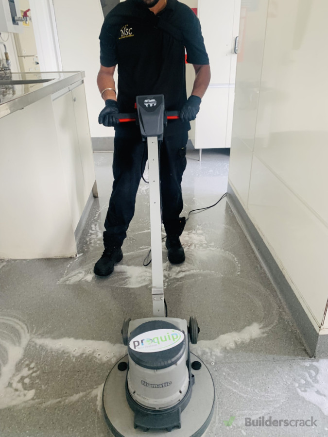 Commercial kitchen floor scrubbing
