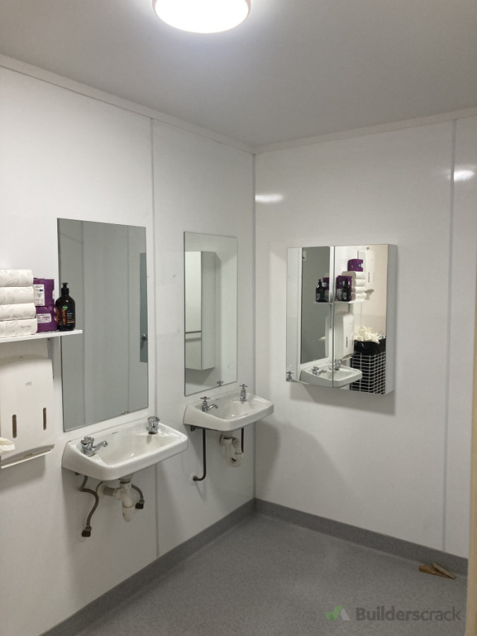 Installed two mirrors and one mirror cabinet in men’s bathroom