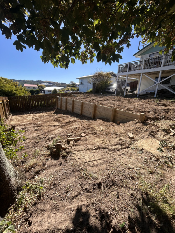 Back yard levelled off with digger and new retaining wall