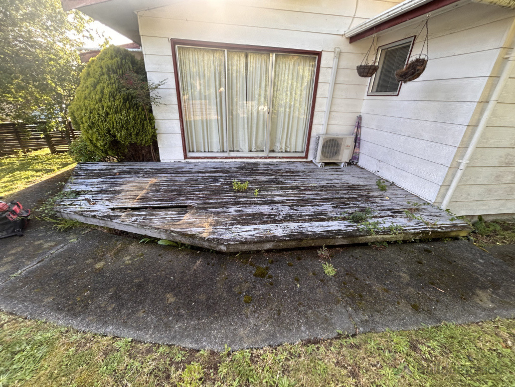 Holes in decking, very much past its used by date