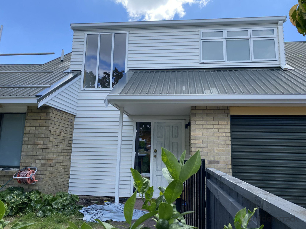 Amazing reclading project in Matua. Including new joinery, fascia and gutters.