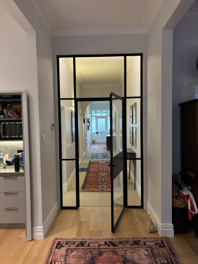 Commission and installation of new steel frame door