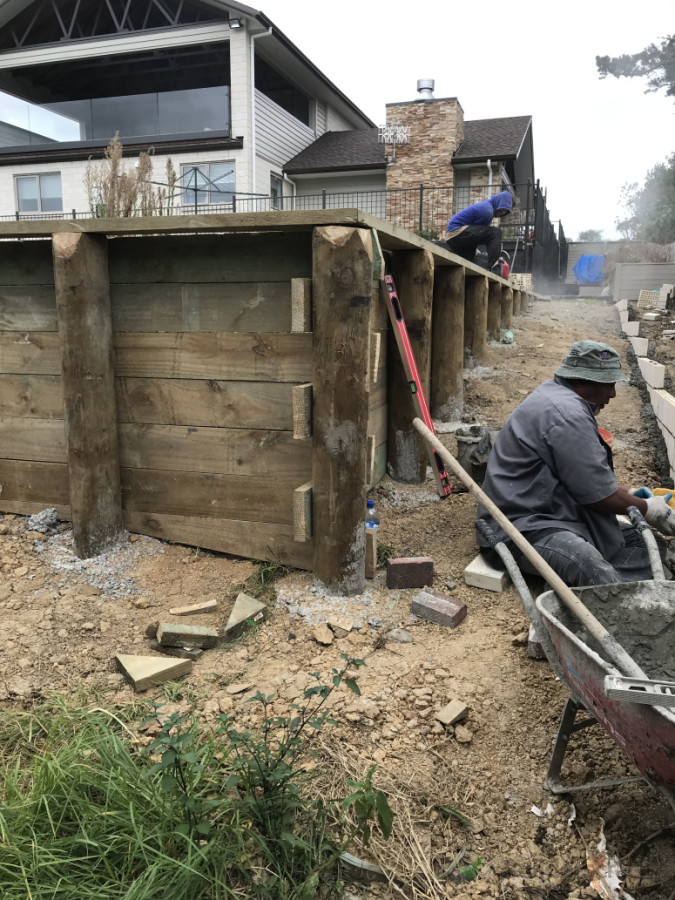 Note the before picture of the steps and planter box on right