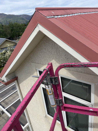 On the knuckle boom doing repairs