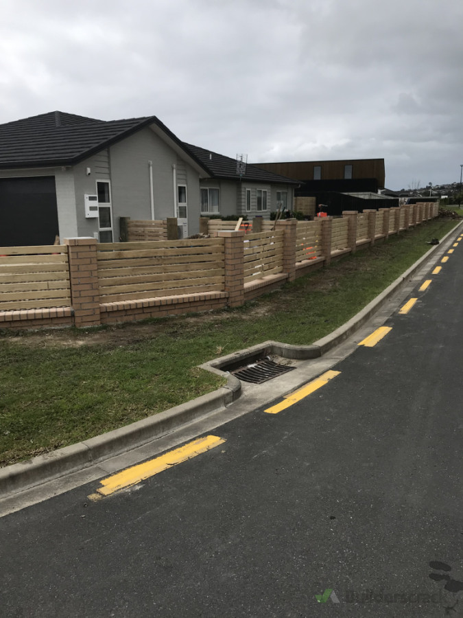Brick fencing with timber inserts