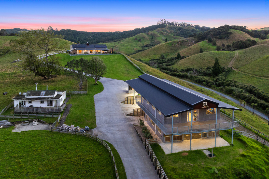 Aerial view of farm shed and house