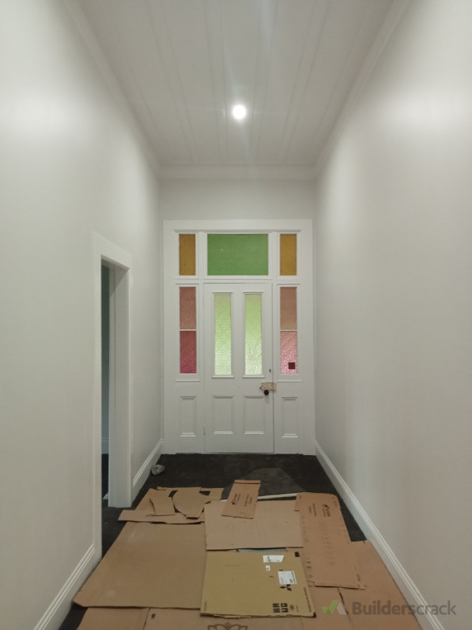 Carefully installed vintage door, preserving original charm with quality craftsmanship and attention to detail.