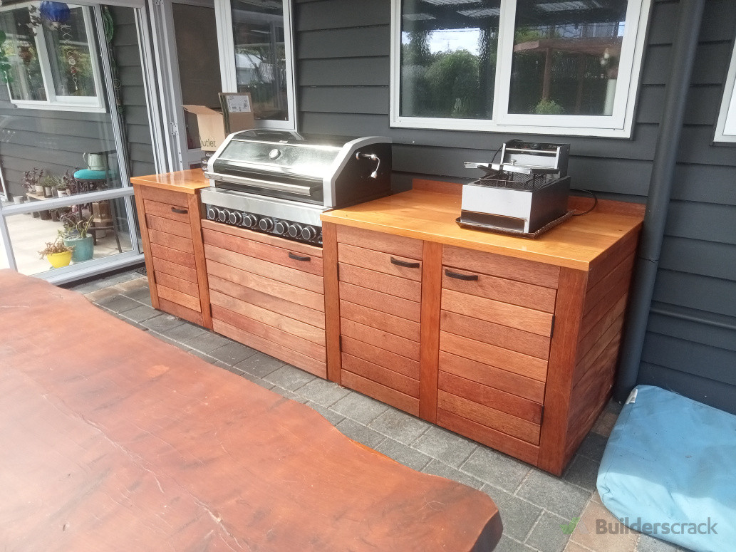 Custom outdoor BBQ area Featuring a handcrafted macrocarpa benchtop and solid Kwila cabinetry, built for durability and timeless outdoor living