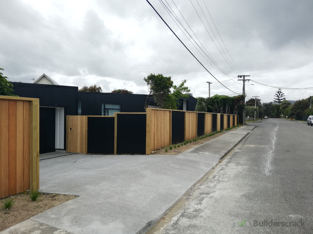 custom built front boundary fence designed to enhance street appeal while providing privacy and security.