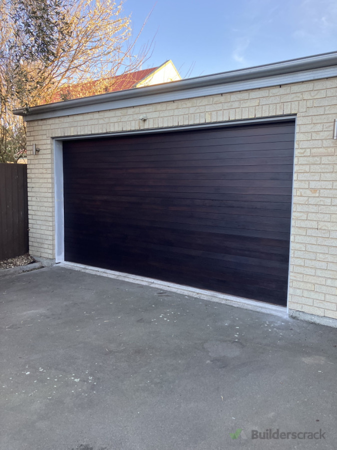 Sand, re-staining & varnish on main garage door