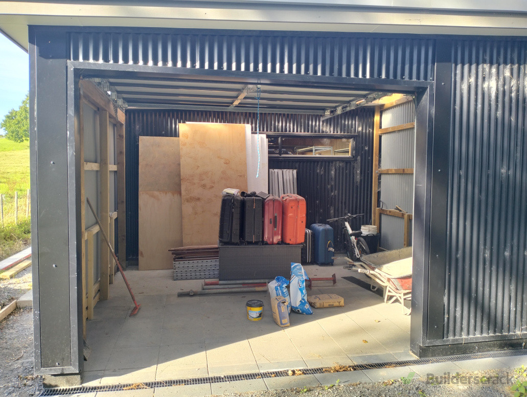 New position for the garage door with paver and drainage