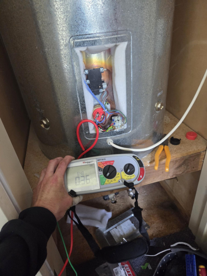 Hot water cylinder element replaced.