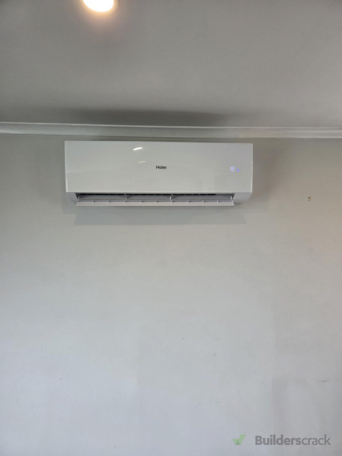 New high wall AC unit installed.