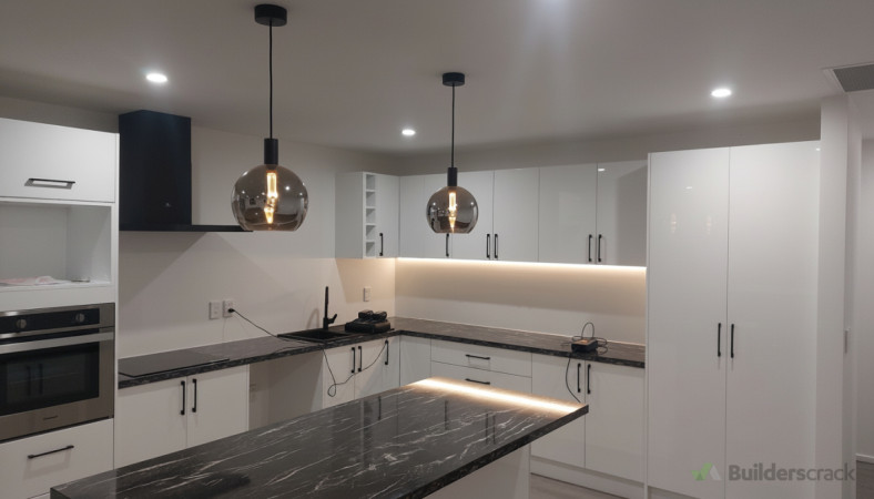 Kitchen with pendants and LED strip lighting